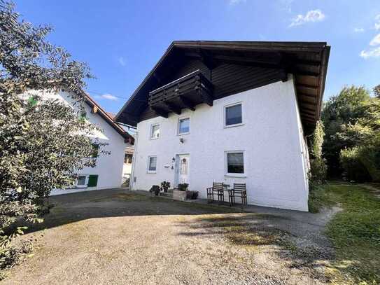 Vermietetes Bauernhaus mit großer Garage und Werkstatt