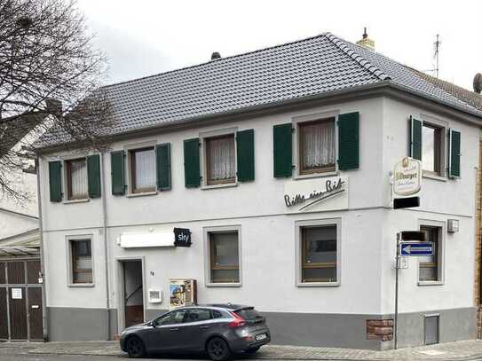 Renditeobjekt – Gebäude mit Sportsbar