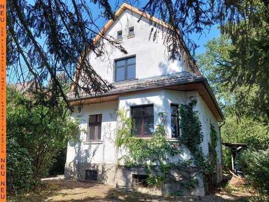 Charmantes Siedlungshaus auf großzügigem Grundstück mit wildromantischem Garten