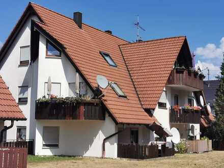 Schicke Zwei-Zimmer-Wohnung im Erdgeschoß mit Terrasse, Tiefgarage und Stellplatz