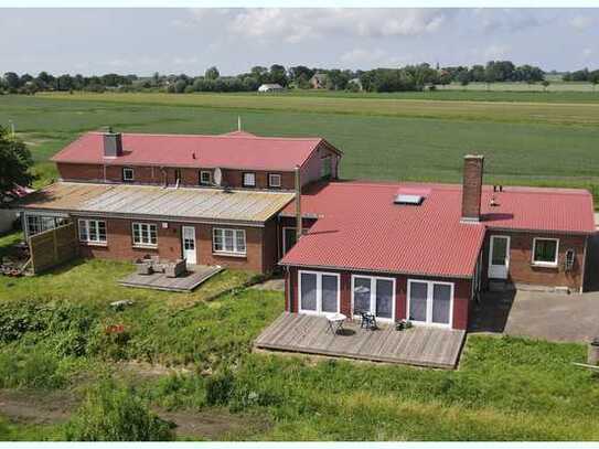 Nordseeheilbad Halbinsel Nordstrand: Voll vermietetes Wohn-Geschäftshaus in zentraler Insellage !