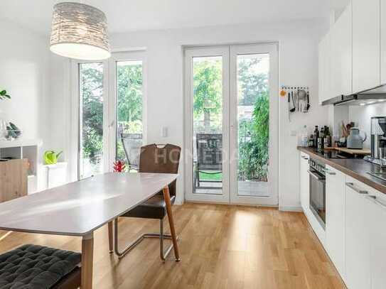 Exklusive und moderne Erdgeschosswohnung mit 2 Zimmern, zwei Terrassen und 2 Tiefgaragenplätzen