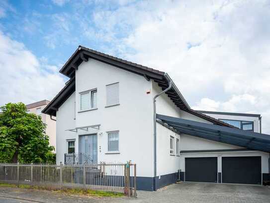 Freistehendes 2-Familienhaus mit Wintergärten und Einliegerwohnung