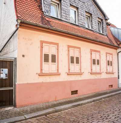 Christian Dik Immobilien / Vermietetes 2-Familienhaus in der Innenstadt