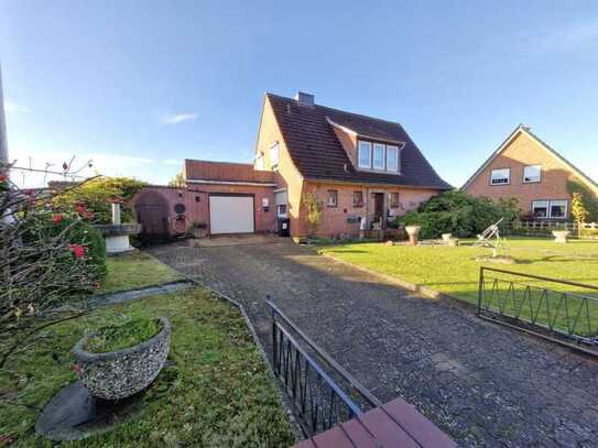 Einfamilienhaus mit Vollkeller und Garage auf sonnigen Grundstück in zentraler Lage von Fockbek