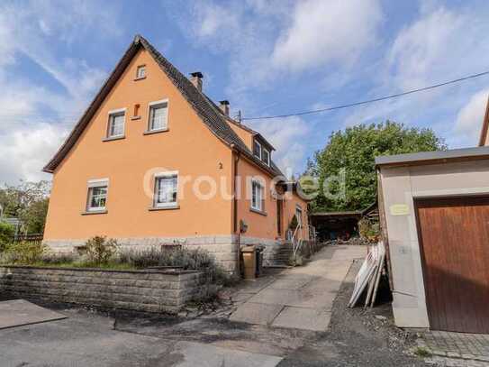 Familienfreundliches Einfamilienhaus mit Einliegerwohnung und Garten in Rauhenebrach