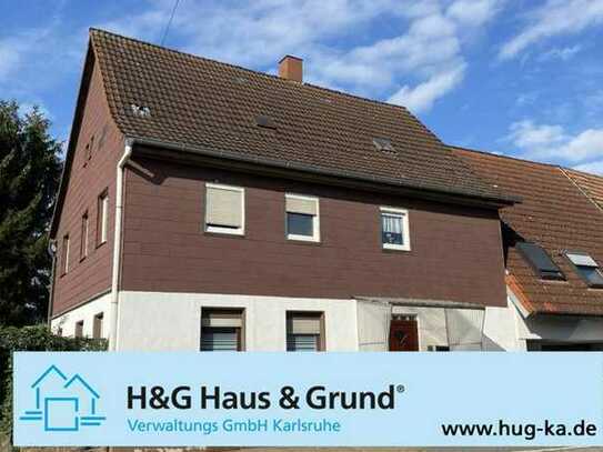 KA-Thomashof! Vermietetes Einfamilienhaus mit herrlichem Grundstück, Garten, Hof und 2 Garagen!