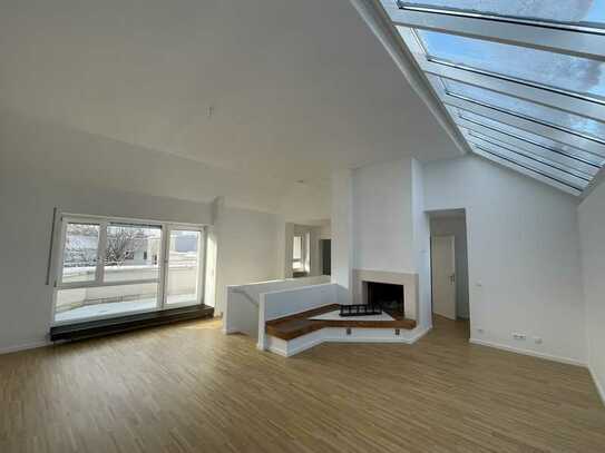 Außergewöhnliche Penthouse Wohnung mit Dachterrasse und Kamin in Neuhausen