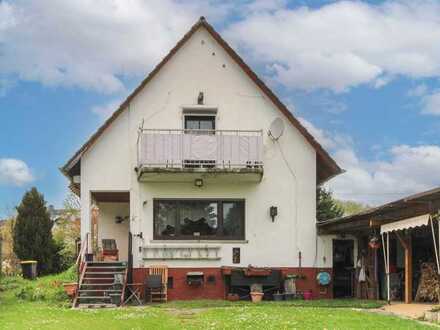Familienfreundliches Einfamilienhaus mit großem Garten und 2 Balkonen