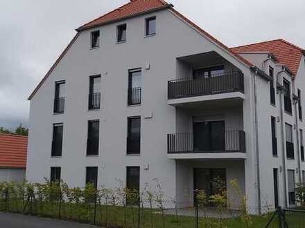 Neuwertige ETW mit Loggia, EBK, Garage u. Stellplätzen
