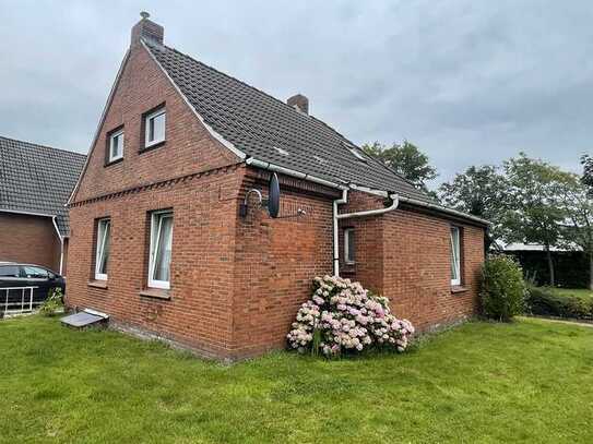 RESERVIERT - Einfamilienhaus mit Garage und Wintergarten in Oldersum