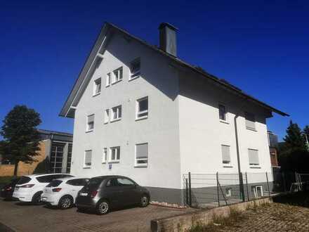 Exklusives Vierfamilienhaus mit modernem Flair und vielseitigen Möglichkeiten