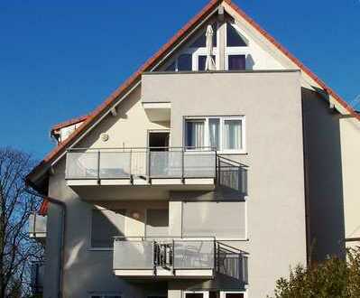 Dachgeschosswohnung mit zwei Balkonen und Blick auf den Schlossgarten in Schwetzingen