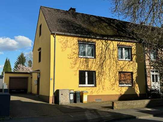 Ein-/Zweifamilienhaus mit schönem Garten und Garage