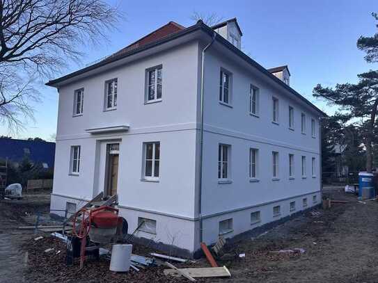 Erstbezug: Doppelhaushälfte mit großem Keller und einem schönen Grundstück in idyllischer Lage