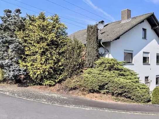 Freistehendes Einfamilienhaus mit Garten und Garage in ruhiger Feldrandlage ohne Makler