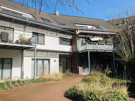 schicke Eigentumswohnung mit Balkon und Tiefgaragenstellplatz