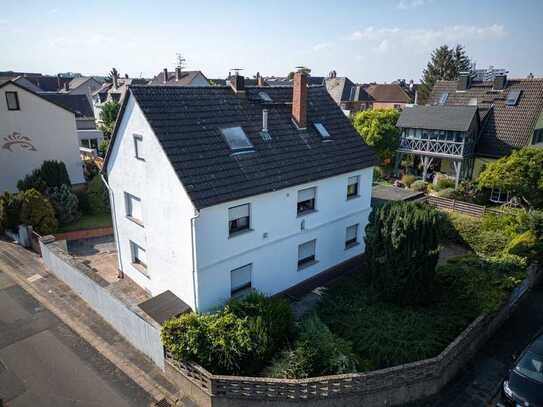 Einfamilienhaus mit viel Potential in direkter Mainlage