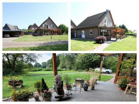 Wohnen in Feldrandlage ! Stilvolles Einfamilienhaus + Doppel-Carport