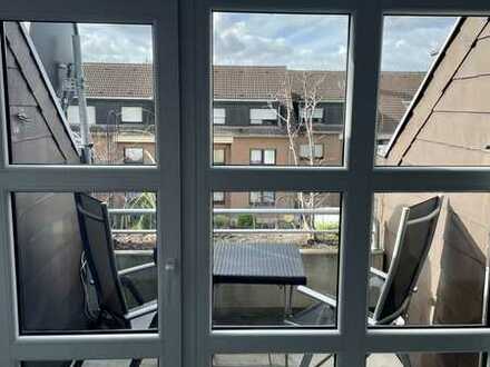 Gepflegte 4-Raum-Maisonette-Wohnung mit Balkon und Einbauküche in Wesseling