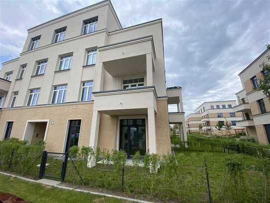 Erstbezug. Wunderschöne Terrassenwohnung mit 72 m² Garten und Parkplatz