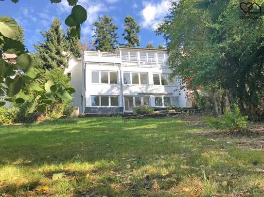 Maisonette-Wohnung mit Terrasse und großen Garten