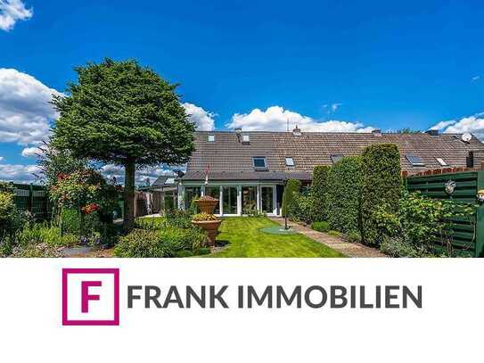 FRANK IMMOBILIEN - EFH mit Wintergarten, Patio, Garage und einzigartiger Garten-Oase!