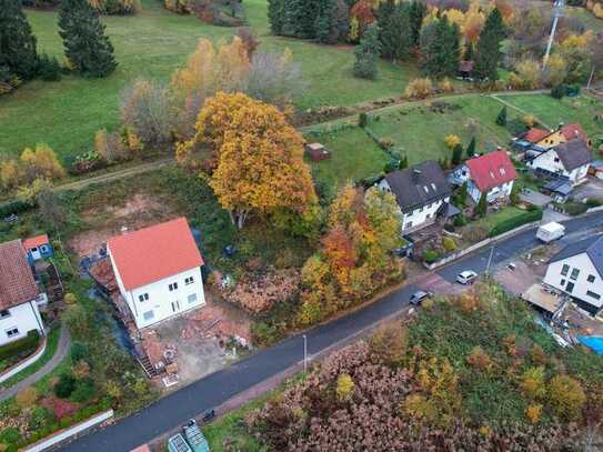 Einzigartige Aussicht: Panoramagrundstück am Hang für Ihr Traumhaus