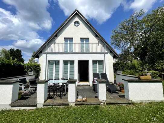 vermietetes Haus mit Fernblick in bevorzugter Höhenlage