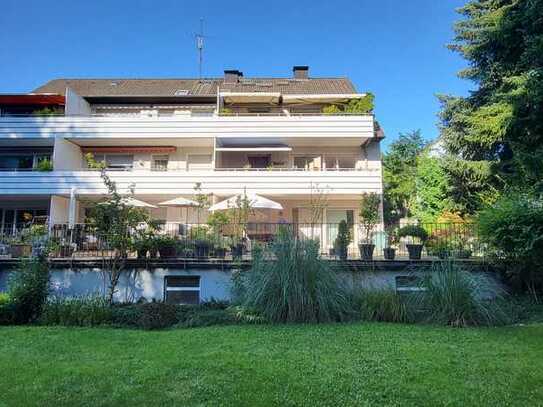 Moderne, vollständig sanierte Erdgeschosswohnung mit großer Terrasse in bester Lage