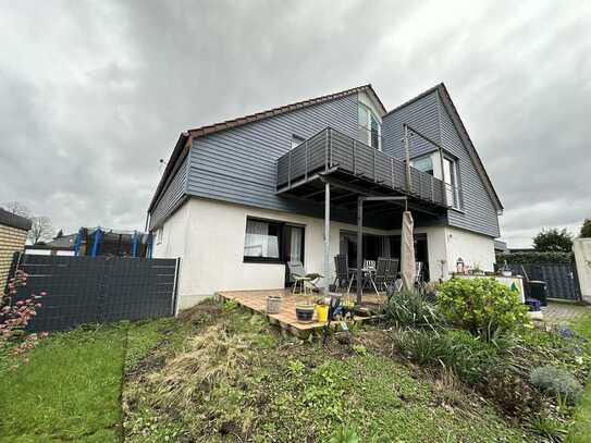 Erdgeschosswohnung mit Garten und Garage in ruhiger Lage