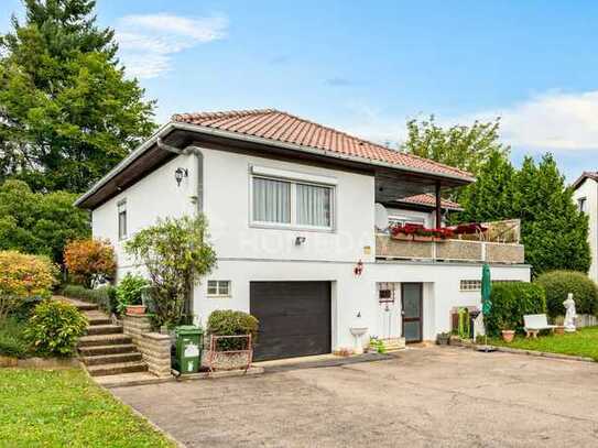 Ihr neues Zuhause in bester Hanglage – gepflegter Bungalow mit viel Platz für die Familie