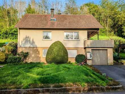 Mein neues zu Hause: Gemütliches Einfamilienhaus, unterkellert, großes Grundstück in Unterheimbach