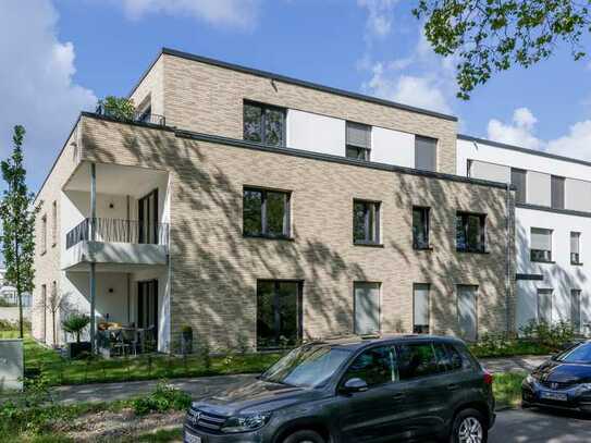Bunter Garten - exklusive 4-Zimmer-Neubau-Wohnung mit Balkon