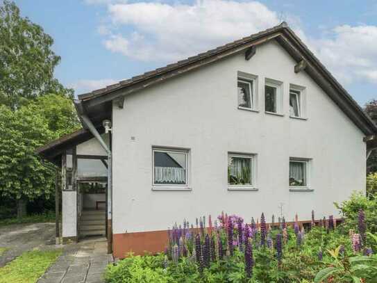 Gartenidylle in Eckental: EFH mit Renovierungsbedarf in Feldrandlage