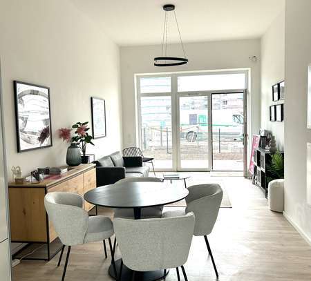 Moderne 3-Zimmer Wohnung mit Terrasse, Einbauküche und kleinem Garten