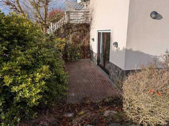 Renovierte 2-Zimmer-Souterrain-Wohnung mit Terrasse und neuer EBK in Butzbach - Fauerbach