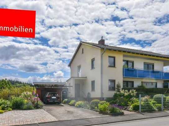 Zweifamilienwohnhaus mit liebevoll angelegtem Garten, Stellplatz und Garage in Weilburg-Gaudernbach