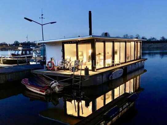 Hochwertiges Hausboot: Ihr schwimmendes Zuhause auf dem Wasser