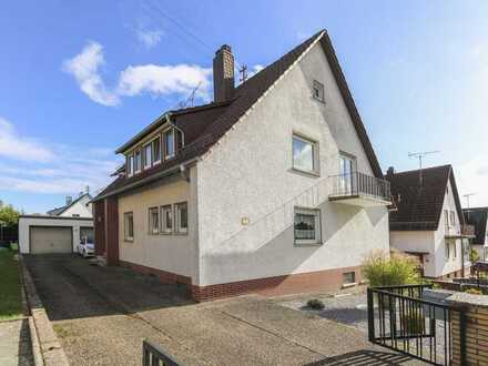 PREISREDUKTION! Drei- oder Mehrgenerationenhaus mit schönem Garten, 2 Balkonen und 3 Garagen