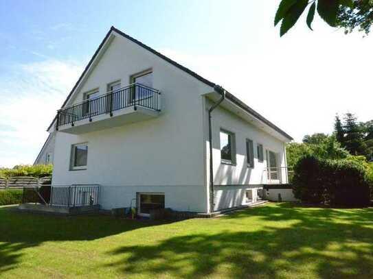 Direkt am Landschaftsschutzgebiet! Moderne und helle 3-Zimmer Wohnung mit Gartenanteil, Balkon & EBK