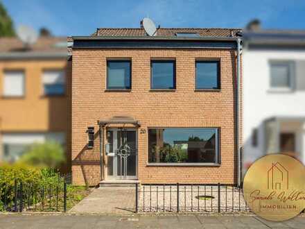 Kompaktes Familienhaus mit neuer Heizung, Garten und Garage