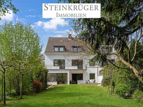 Vielseitiges Zweiparteienhaus mit Garten, Südterrasse & Garage in Köln-Marienburg