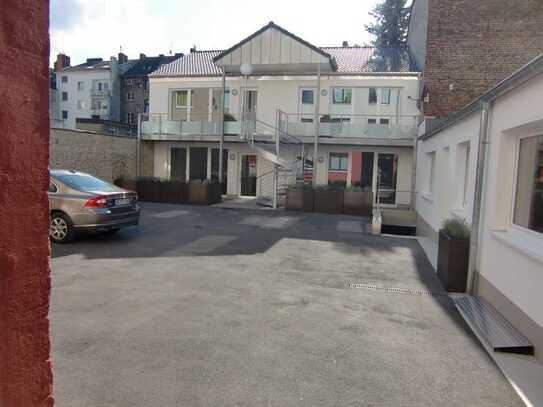 Moderne Neubauwohnung (2025) mit Terrasse/Zentrum/geschützte Innenhoflage/barrierefrei