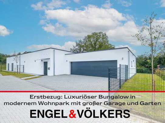 Erstbezug: Luxuriöser Bungalow in modernem Wohnpark mit großer Garage und Garten