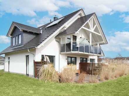 Einzigartiges Investment am Selliner See: Hochwertiges Dreifamilienhaus mit atemberaubendem Seeblick