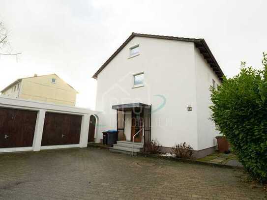 Komfortables Zweifamilienhaus mit Terrasse, Balkon und idyllischem Garten