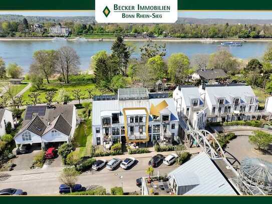 Großzügige Maisonette-Wohnung mit zwei Balkonen, Einbauküche und TG-Stellplatz in direkter Rheinlage