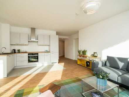 Großzügige 3-Zimmer-Wohnung mit moderner Designküche und Südost-Balkon in zukunftsweisendem Bauwerk