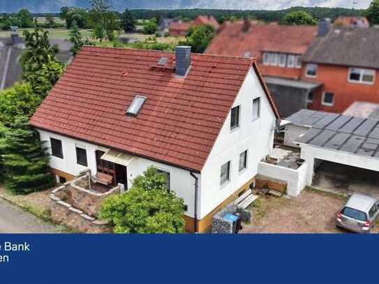 Einzigartige Wohngelegenheit in Helstorf – Einfamilienhaus mit großer Garage für vier Autos